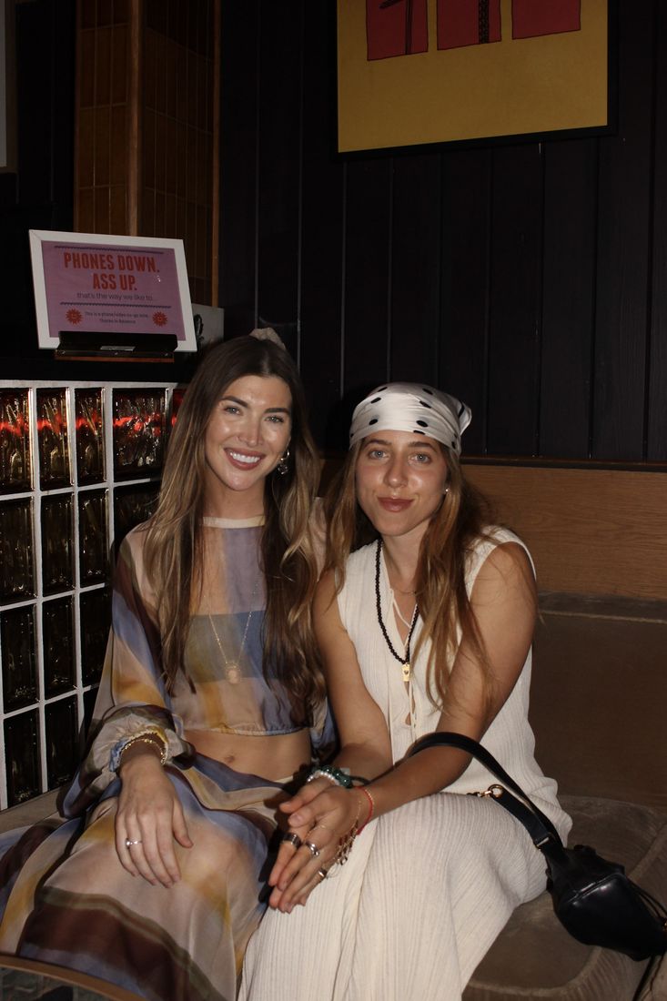 Amanda and Savannah sitting together at BeyBey